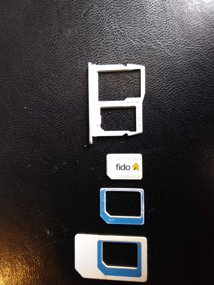 Note how the sim card has to align with the tray. ( Fido card used as an example because its deactivated.)
